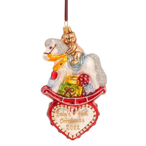 baby's first Christmas 2022 red ornament rocking horse on hear with presents and teddy bear 